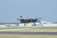 N700F @ KOSH - Departing for fly overs during the air show - by Glenn E. Chatfield