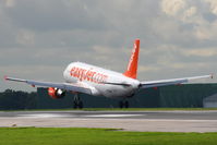 G-EZUA @ EGCC - easyJet - by Chris Hall