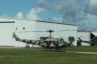 N662MC @ KPGD - Bell UH-1H - by Mark Pasqualino