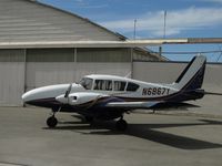 N6867Y @ CNO - Parked by the hanger - by Helicopterfriend