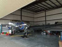 N5QQ @ CNO - Parked in a hanger with her sister - by Helicopterfriend