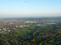 G-CDWN - Taken from G-AWFZ when flying inbound to Cranfield. The SKY hotair balloon is a regular sight around Milton Keynes and this was the second evening in a row I caught it inflight. Floating over Caldecotte lake, Milton Keynes. - by Ashley Flynn