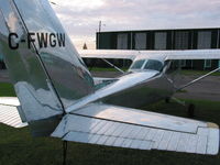CF-WGW @ NT7 - CF-WGW parked at Picton, Ontario. Aircraft paint has been stripped and is now polished aluminum. - by Dave Carnahan