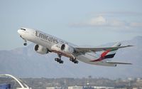 A6-EWH @ KLAX - Departing LAX - by Todd Royer