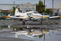 N211CR @ TJIG - Reflection in the water. - by Angel Moreno, PR Spotter