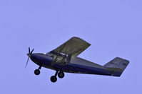 N281JS @ KGED - Flying over the field at GED Wings & Wheels 2010 - by M. Lee Derrickson