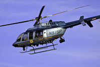 N97SP - Leaving accident scene with patient - by M. Lee Derrickson