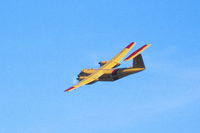 115457 @ KDPA - Fly by over runway 10 - by Glenn E. Chatfield