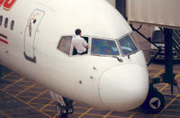 G-OOOW @ EGCC - Air 2000 , Co-pilot is cleans his window - by Henk Geerlings