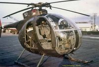 68-17347 - This Air Cav loach landed at Nha Be, RVN for fuel.  It was so hot, the doors were removed and held in the back with bunji cords.