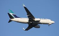 C-FWSO @ MCO - West Jet 737 - by Florida Metal