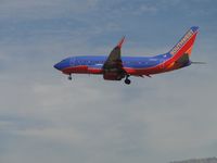 N762SW @ ONT - Passed the hawk eyes and approaching the outer fence - by Helicopterfriend