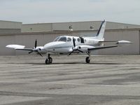 N4171Q @ CNO - Parked near the paint shop area with door open - by Helicopterfriend