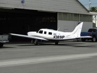 N381HP @ CNO - Parked at a hanger - by Helicopterfriend