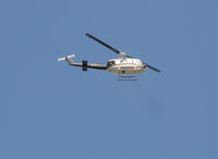 N750HP - Huey flying over Bristol Motor Speedway on Friday, October 14, 2011.