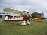N77ED @ 2TE2 - Stearman N77ED with N621SR at Flying Oaks Tx. Memorial Day - by E.Oltheten