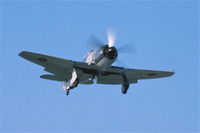 N56SF @ KDPA - On approach to runway19R fly close to the old control tower.  35mm slide - by Glenn E. Chatfield