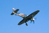 N56SF @ KDPA - On approach to runway19R fly close to the old control tower.  35mm slide - by Glenn E. Chatfield