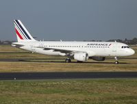 F-GKXY @ LFPG - Landed next to stablemate F-GUGP - by Alain Durand