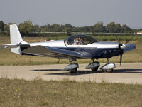 F-34AID @ LFNG - Shining piece of aerospace technology, just landed, taxiing to the hangar. With a nice wave of the copilot to the photographer ;-) - by Philippe Bleus