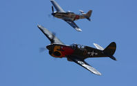 N1195N @ RTS - Trying to race against a mustang... Reno 2010 - by olivier Cortot