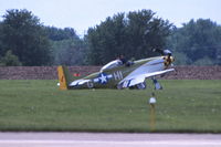 N6306T @ KDVN - Tugged off to another area after the belly landing. - by Glenn E. Chatfield