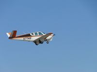N774B @ VNY - Taking off and retracting wheels - by Helicopterfriend