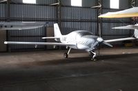 G-IOWE @ EGFH - Resident Europa XS in Swansea Airport's Bellman hangar. - by Roger Winser