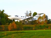 N406CM @ KOQN - KOQN Departing runway 27 - by Richard Shapero