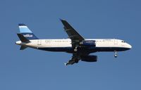 N636JB @ MCO - all wrapped up in blue - by Florida Metal