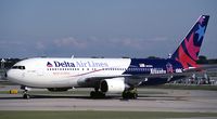 N102DA @ KORD - Sept. 1995 - In special colors for the Olympics in Atlanta the following year.
