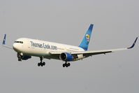 G-TCCA @ EGCC - Thomas Cook B767 getting caught by the strong crosswind while on approach to RW23R - by Chris Hall