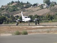 N421LA @ POC - Taxiing back to the hanger on taxiway Sierra - by Helicopterfriend