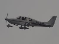 PH-AMI @ AMS - Flyover on the promenade of Schiphol Airport - by Willem Goebel