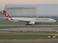 TC-JNL @ AMS - Taxi to the runway24 on Schiphol Airport - by Willem Goebel