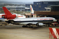 N149US @ EGKK - Northwest Orient at LGW - by John Meneely