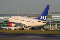 LN-RRP @ EGCC - SAS Scandinavian Airlines - by Chris Hall