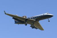 N990EA @ KSAT - Landing 12R - by RWB