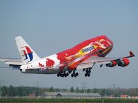 9M-MPD @ AMS - Take off from Schiphol Airport on runway 36L - by Willem Goebel