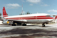 N2276X @ KMIA - Stored at MIA - faded Tampa Colombia logo on fin - by John Meneely