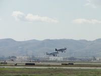 N7715C @ CNO - Lead ship in formation take off from runway 26L, landing gear starting to be retracted - by Helicopterfriend