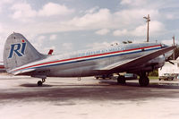 N74173 @ KMIA - Rich International C-46 seen at MIA in 1982