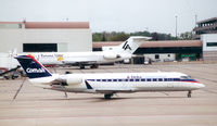 N916CA @ CVG - Comair Delta Connection - by Henk Geerlings