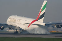 A6-EDC @ EGCC - nice smoky landing - by Chris Hall