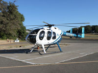 N209EC @ O61 - Parked on the tarmac in Cameron Park......yet the A/FD clearly states, Helicopter parking not
authorized.  Awesome flaunt against those rotorcraft bigots!