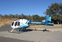 N209EC @ O61 - Parked on the tarmac in Cameron Park......yet the A/FD clearly states, Helicopter parking not
authorized.  Awesome flaunt against those rotorcraft bigots!