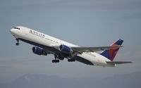 N130DL @ KLAX - Departing LAX - by Todd Royer