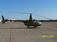 N31GM @ KMCC - Sitting on the tarmac at KMCC.  Formerly with the ponzi scheme flight school, Silver State Helicopters. - by BadWool