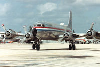 N4989V @ KMIA - Rich International - taxiing to the ramp - by John Meneely
