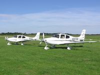 N297SR @ EGBT - A brace of Cirrus (Cirri?) at Turweston
